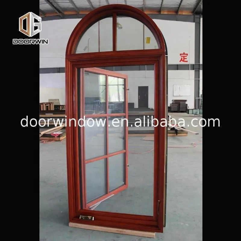 American casement window grill design wooden crank open outward arched top window by Doorwin on Alibaba