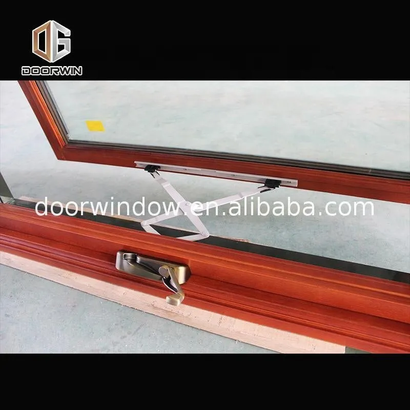 American casement window grill design wooden crank open outward arched top window by Doorwin on Alibaba