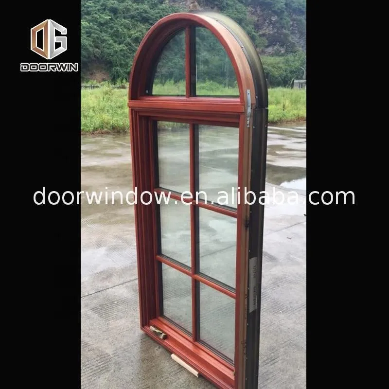 American casement window grill design wooden crank open outward arched top window by Doorwin on Alibaba